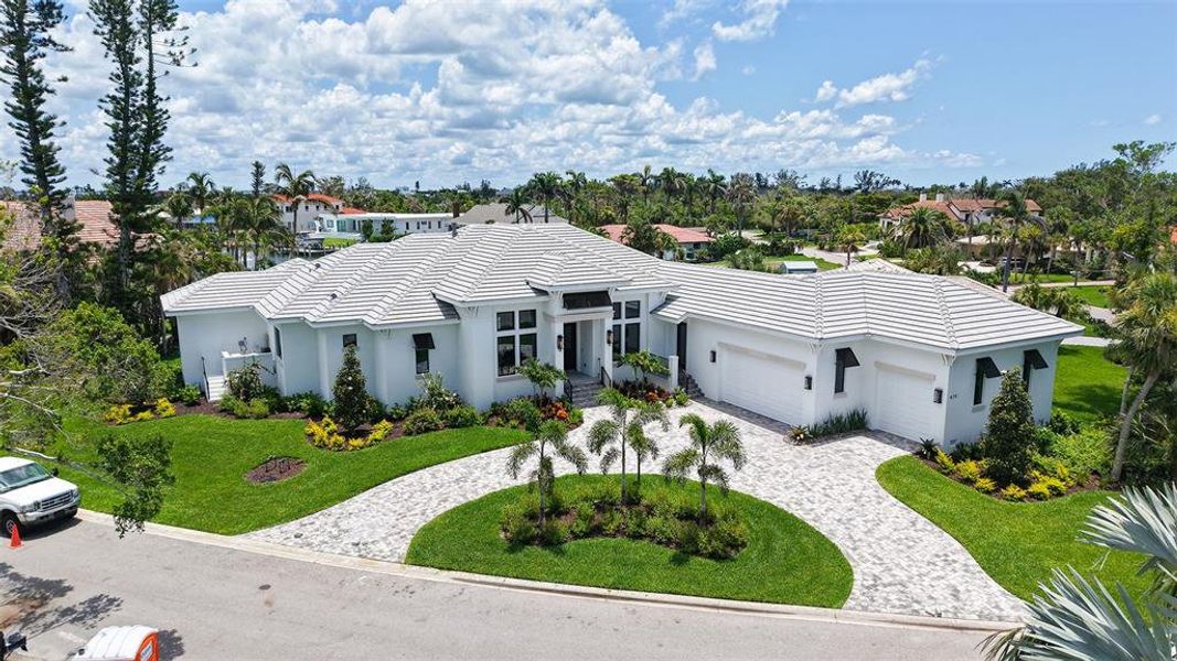 Front exterior of a new home in , Longboat Key, FL, highlighting curb appeal (Image 27).