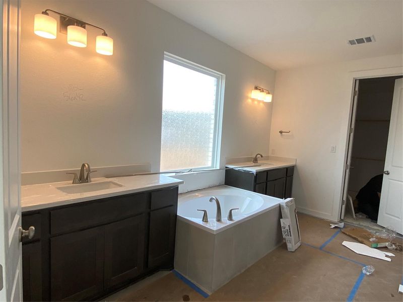 Primary Bath retreat with dual vanities & garden tub