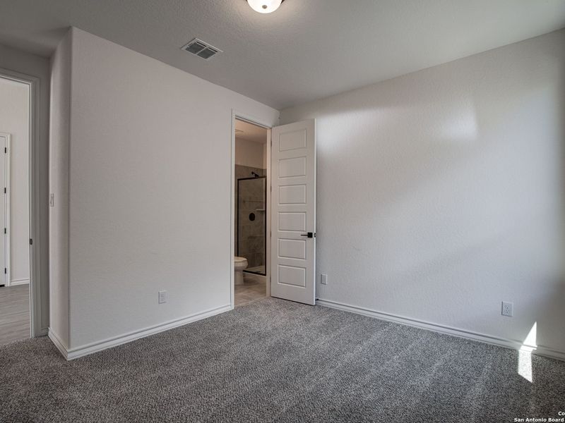 Spacious, unfurnished interior of a new home in The Reserve at Potranco Oaks, Castroville (Image 39).