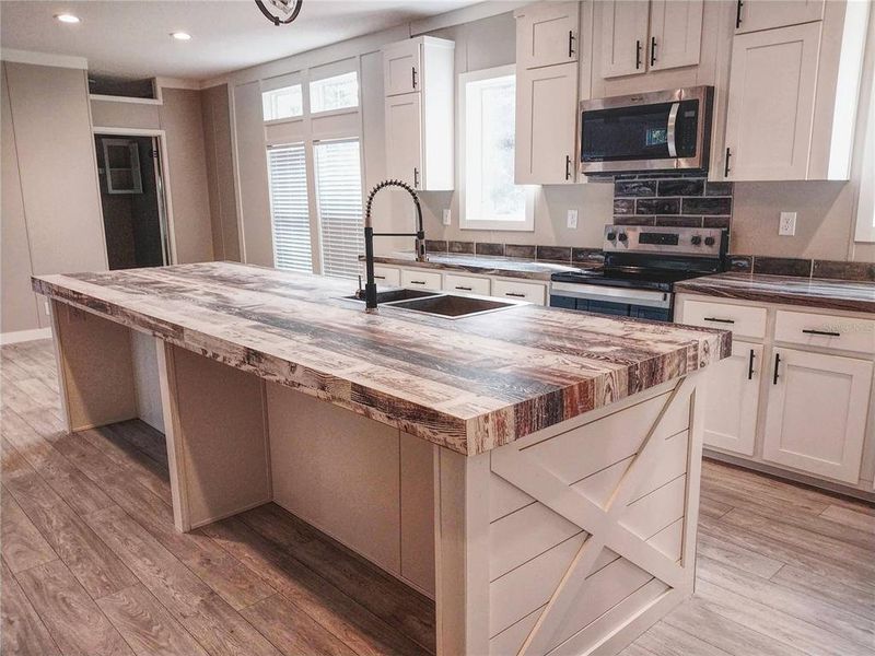 Furnished interior view inside a new home in , Frostproof (Image 11). Furnished interior view inside a new home in , Frostproof (Image 11).