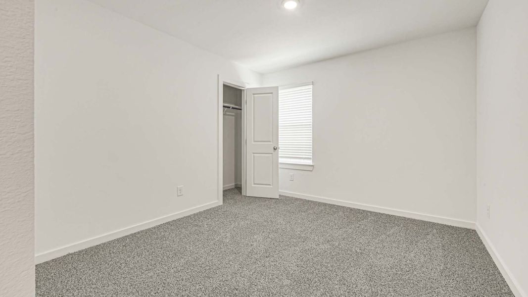 Representative unfurnished interior of a home built from the Cali by D.R. Horton in Holly Ridge, Rosenberg (Image 25).