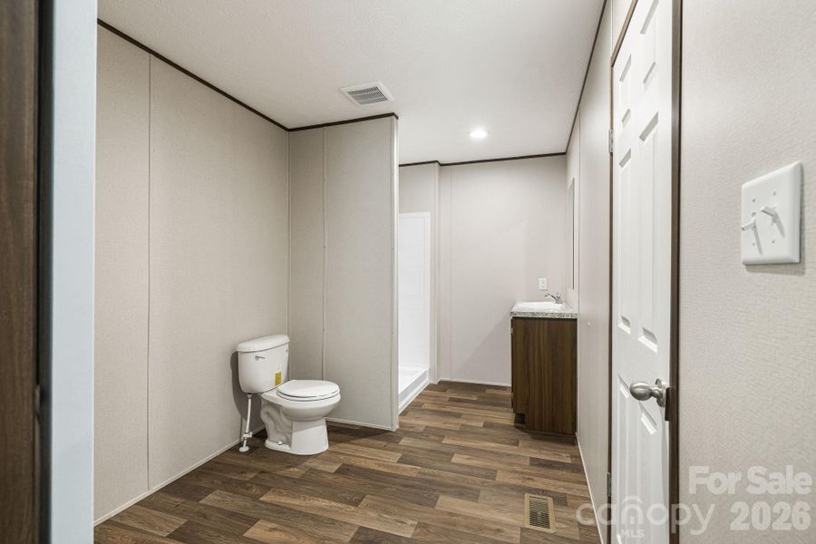 Enormous primary bathroom on main level (off primary bedroom)