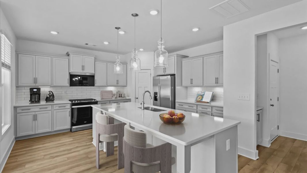 2 story single family home, all white, kitchen