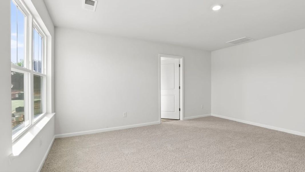Spacious, unfurnished interior of a new home in Varner Station, Woodruff (Image 29).