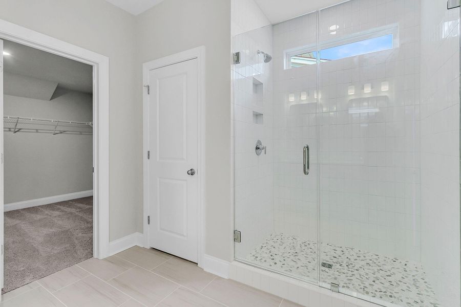 Spacious, unfurnished interior of a new home in Tidewater at Lakes of Cane Bay, Summerville (Image 24).