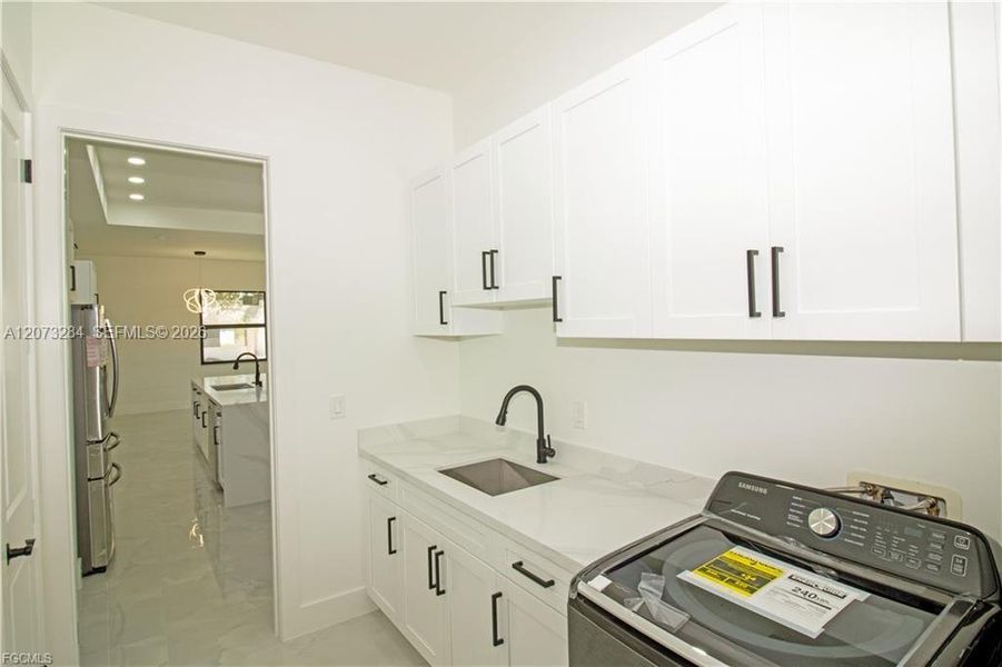 Furnished interior view inside a new home in , Lehigh Acres (Image 16).
