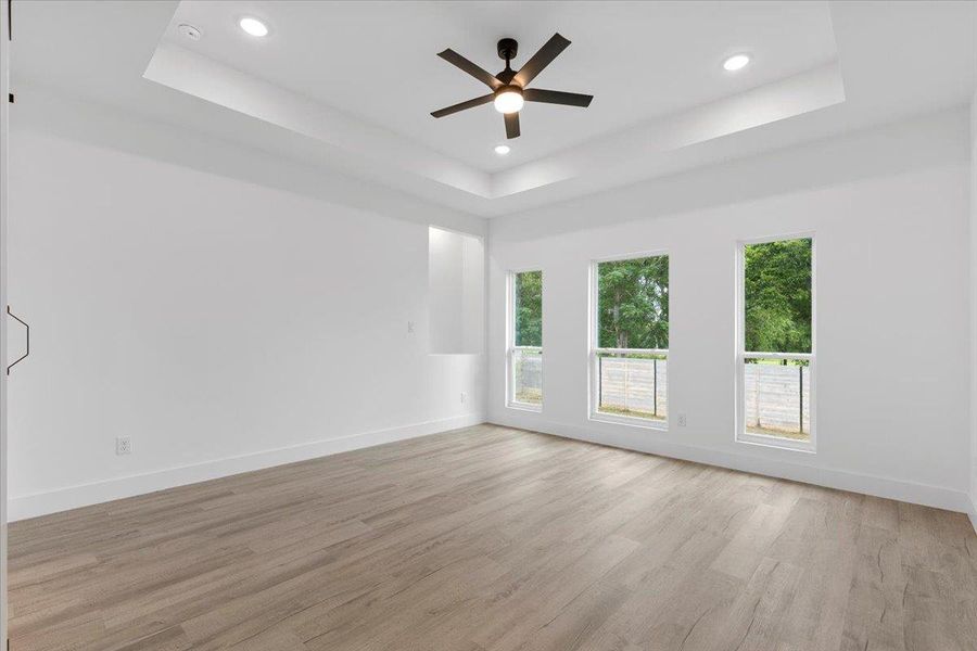 Primary room with a tray ceiling Primary room with a tray ceiling