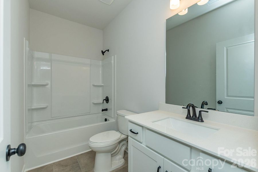Furnished interior view inside a new home in Sunset Meadows, Charlotte (Image 9).