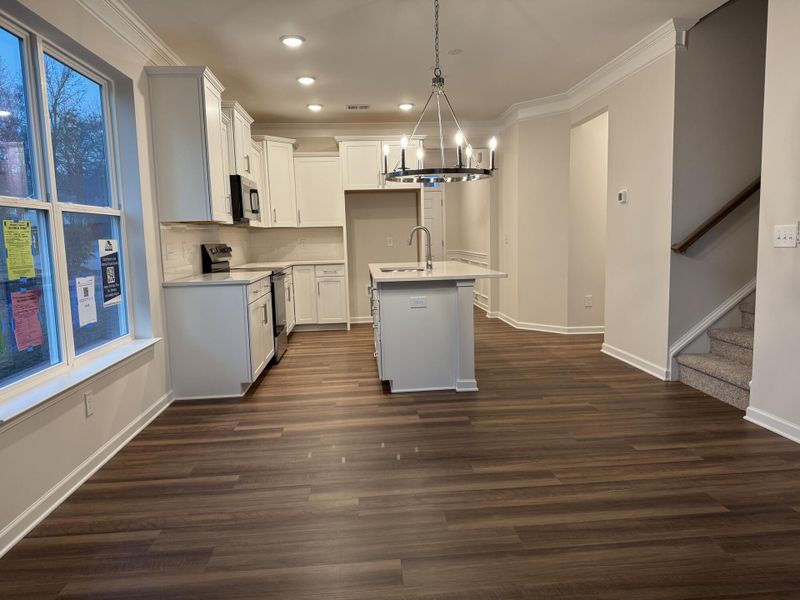 Spacious, unfurnished interior of a new home in East Main Townes, Spartanburg (Image 11).