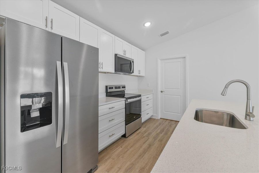 Furnished interior view inside a new home in Cape Coral, Cape Coral (Image 10). Furnished interior view inside a new home in Cape Coral, Cape Coral (Image 10).