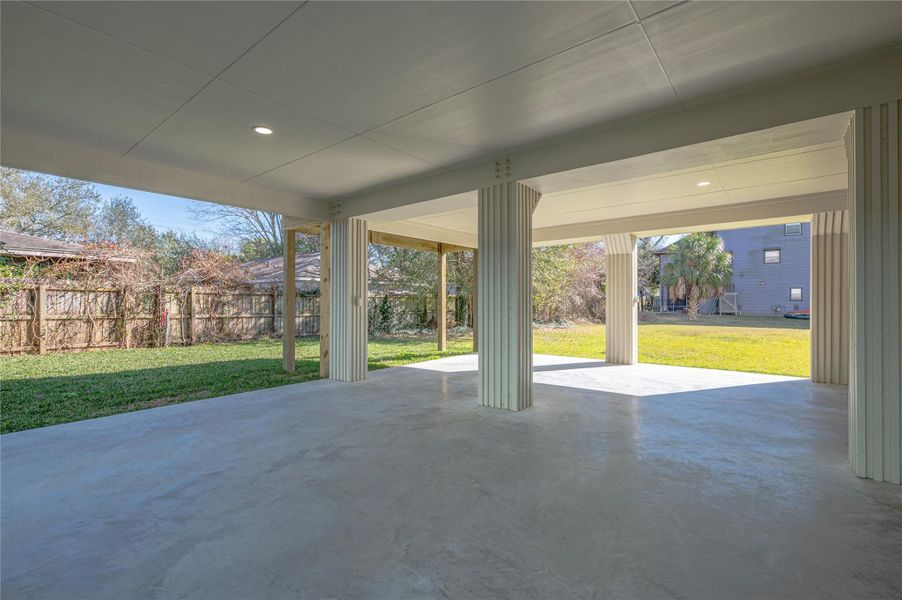 Additional covered area that could be enclosed for more garage or workshop space