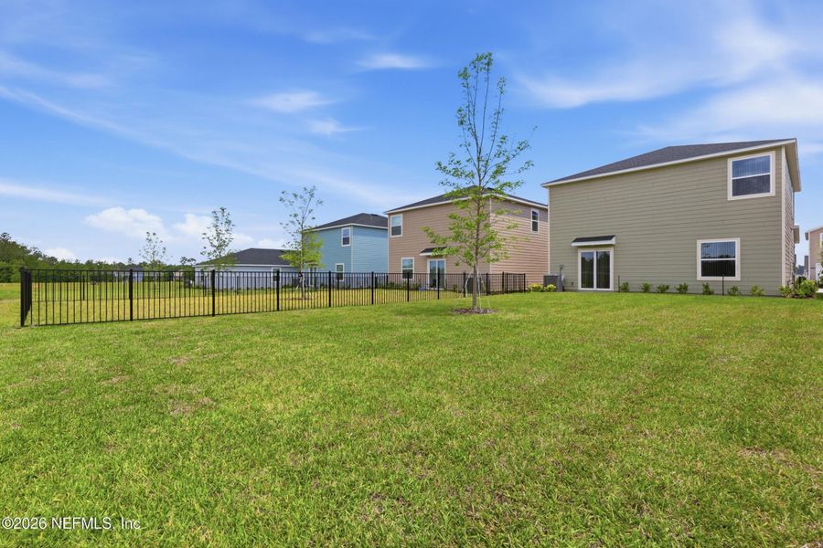 Exterior details and patio area of a home in Holstein Crossing, Green Cove Springs (Image 25).