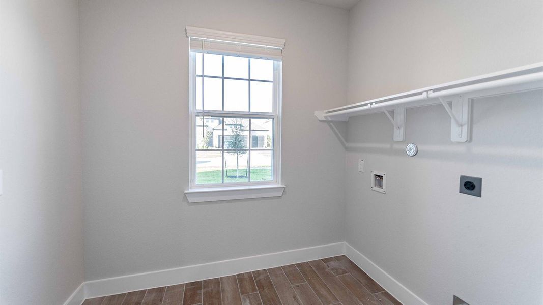 Spacious, unfurnished interior of a new home in Sunterra, Katy (Image 12).