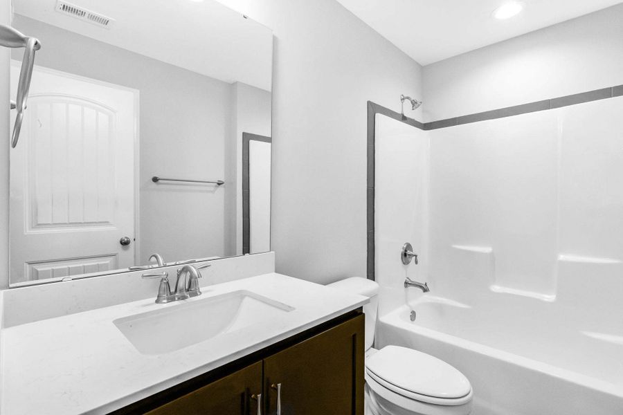 Representative furnished interior of a home built from the Clayton by Caviness & Cates Communities in Bartlett Manor, Youngsville (Image 227).