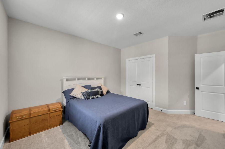 Furnished interior view inside a new home in The Woodlands Hills 60’, Willis (Image 13).