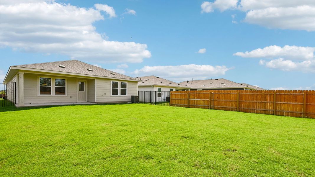 Exterior details and patio area of a home in Trails at Wildhorse, Austin (Image 22).