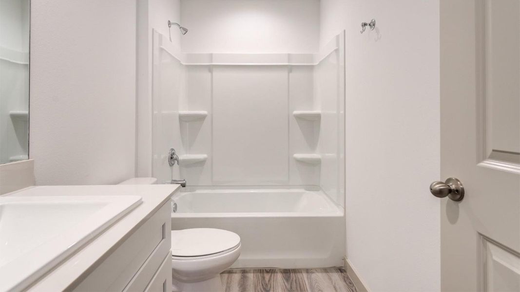 Representative furnished interior of a home built from the The Ashburn by D.R. Horton in Allen Farms, Lubbock (Image 11).