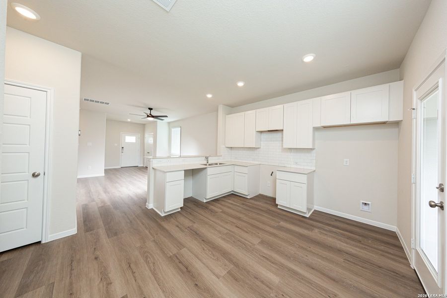 Furnished interior view inside a new home in Timber Creek, San Antonio (Image 6).