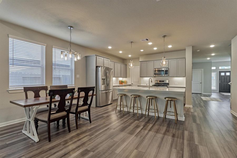 Furnished interior view inside a new home in The Highlands - Grove Collection, Porter (Image 15).