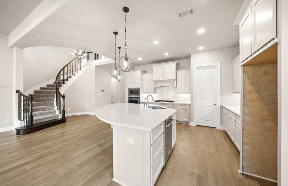 Representative furnished interior of a home built from the 3070 by Ravenna Homes in The Highlands 55′, Porter (Image 14).