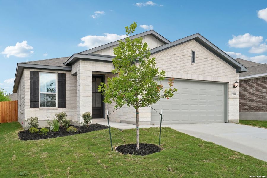 Front exterior of a new home in Sagebrooke - Premier Series, San Antonio, TX, highlighting curb appeal (Image 16).