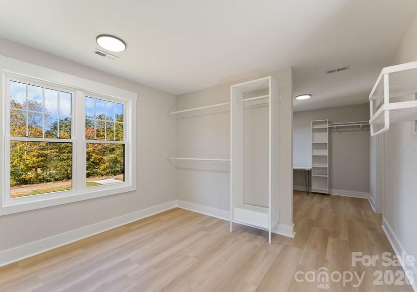 HUGE Walk In Primary Closet