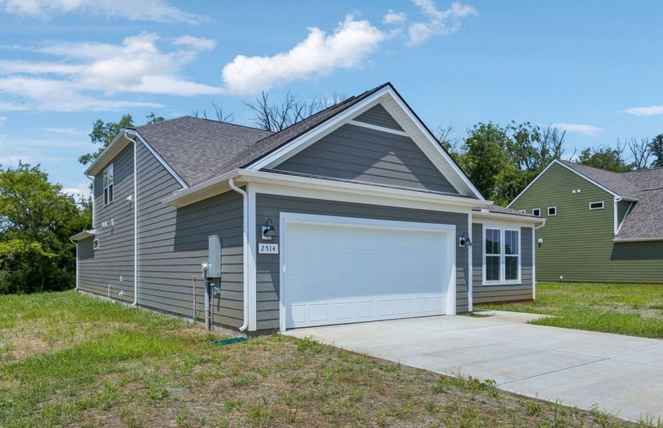Front exterior of a new home in Glenview Farms, Murfreesboro, TN, highlighting curb appeal (Image 27). Front exterior of a new home in Glenview Farms, Murfreesboro, TN, highlighting curb appeal (Image 27).