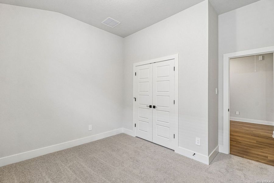 Spacious, unfurnished interior of a new home in Estancia Ranch - Classic Series, San Antonio (Image 26).