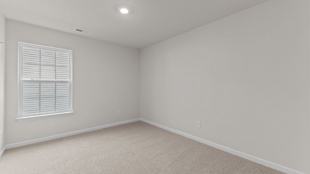 Spacious, unfurnished interior of a new home in Madeline Farm, New Bern (Image 21).