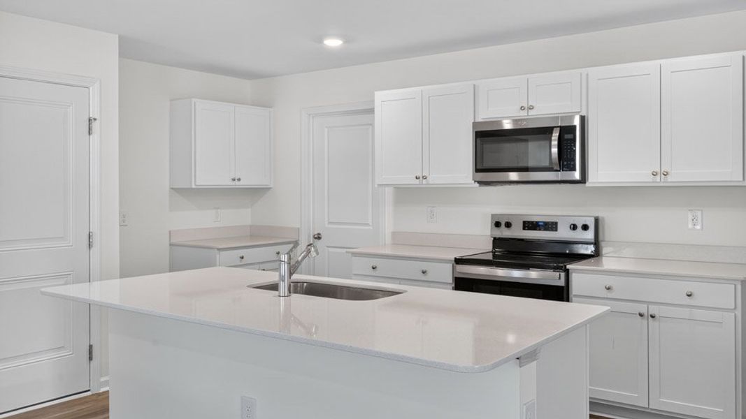 Furnished interior view inside a new home in Fishel Village, Winston-Salem (Image 5). Furnished interior view inside a new home in Fishel Village, Winston-Salem (Image 5).