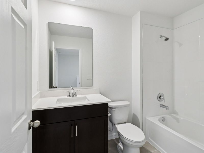 Furnished interior view inside a new home in Cagan Crossings West, Clermont (Image 6).