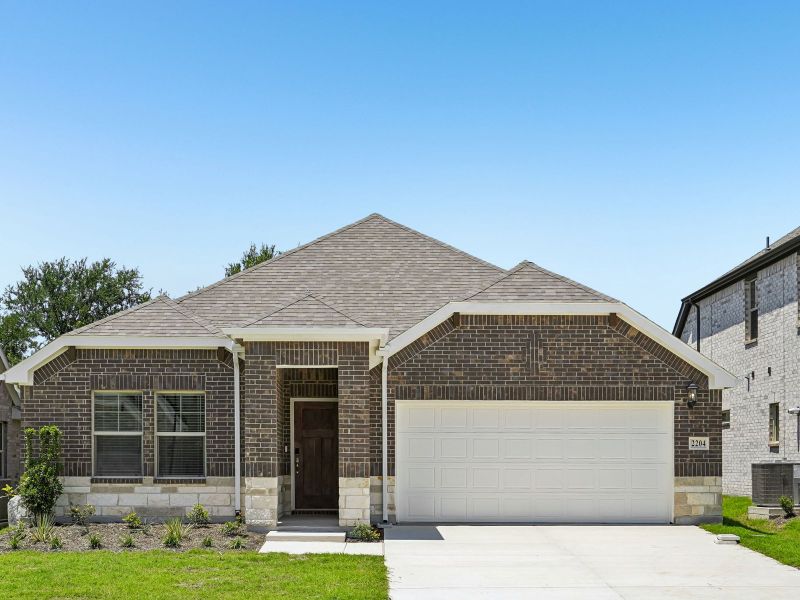 Front exterior of a new home in Stella Hills, Denton, TX, highlighting curb appeal (Image 1). Front exterior of a new home in Stella Hills, Denton, TX, highlighting curb appeal (Image 1).