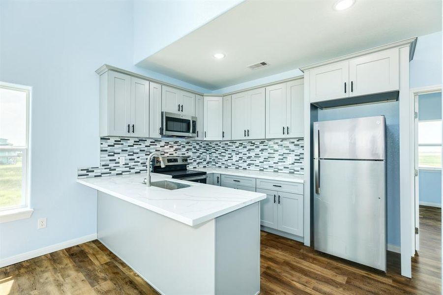 Furnished interior view inside a new home in , Freeport (Image 3).