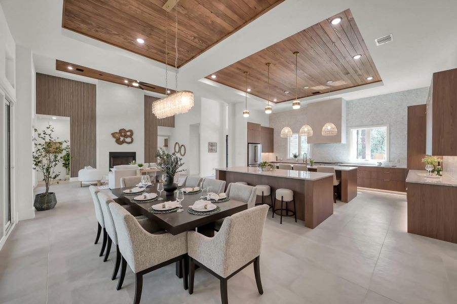 Positioned to capture natural light and scenic views, the dining area offers an elegant yet comfortable setting for both everyday meals and special occasions.