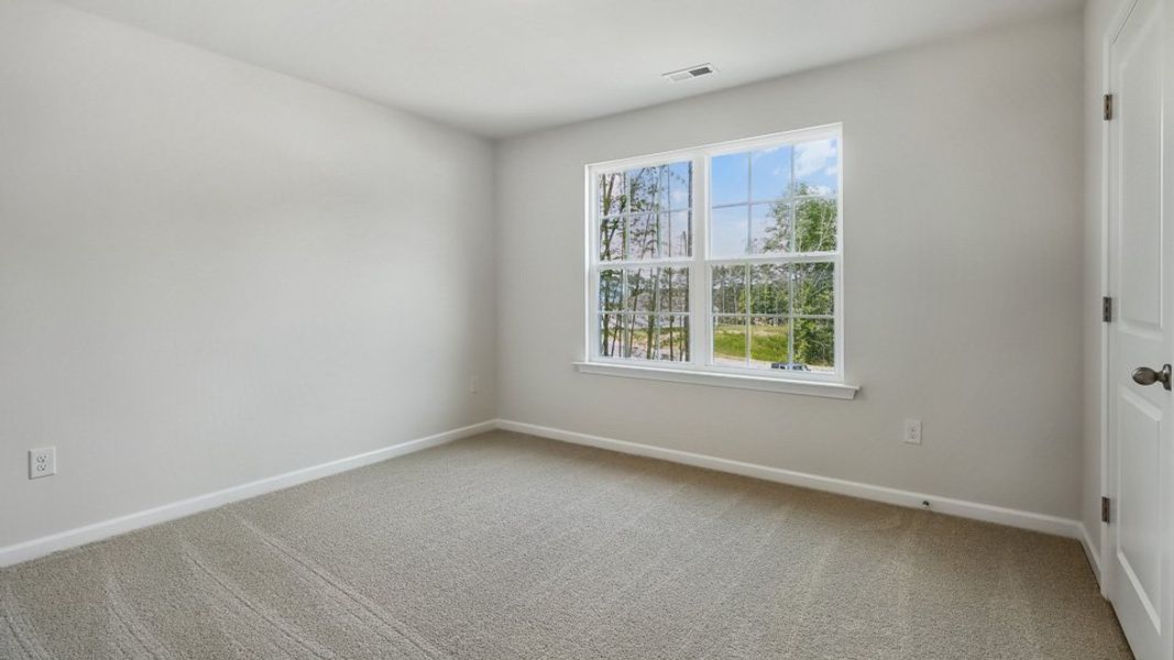 Spacious, unfurnished interior of a new home in Tyler - Home on the Lake, New Bern (Image 23).