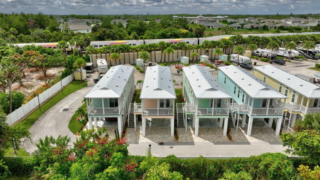 Front exterior of a new home in , Jensen Beach, FL, highlighting curb appeal (Image 19).