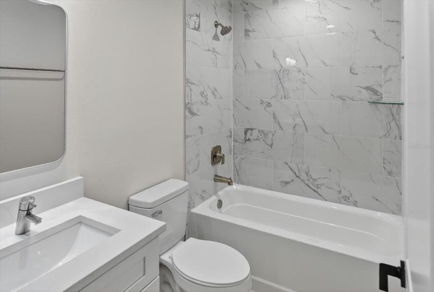 Furnished interior view inside a new home in , Port Charlotte (Image 10).