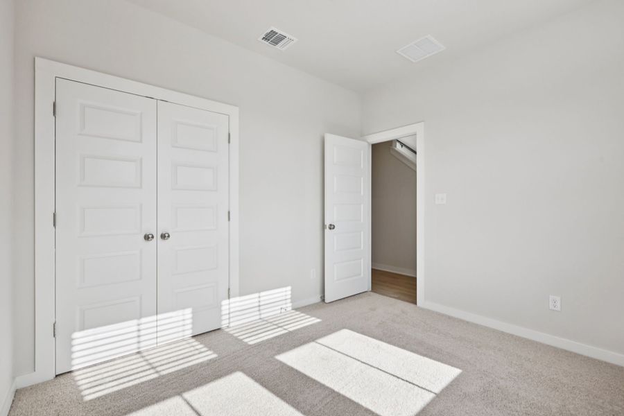 A room with white doors.