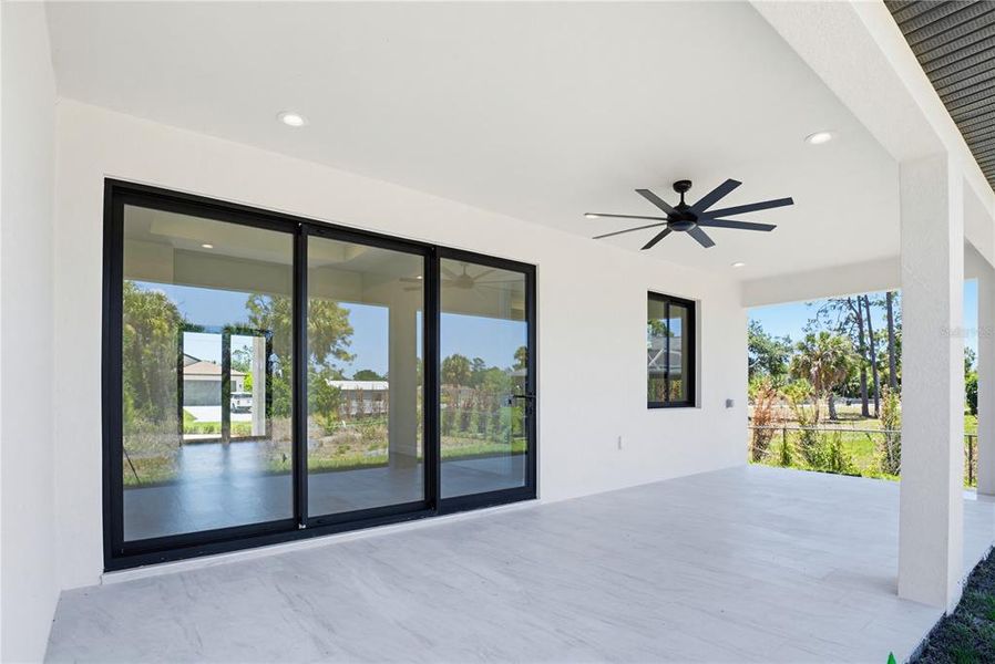 Exterior details and patio area of a home in , North Port (Image 26).