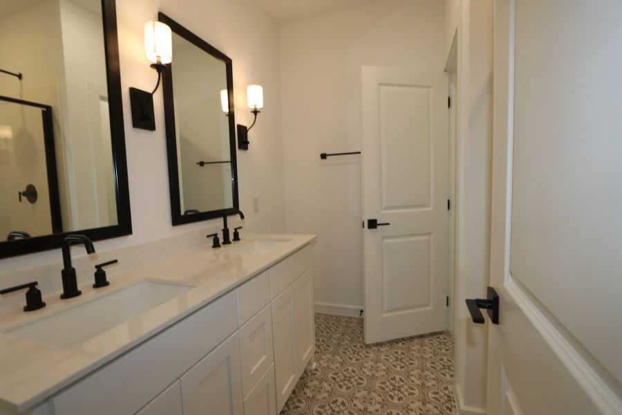 Primary bath with matte black fixtures