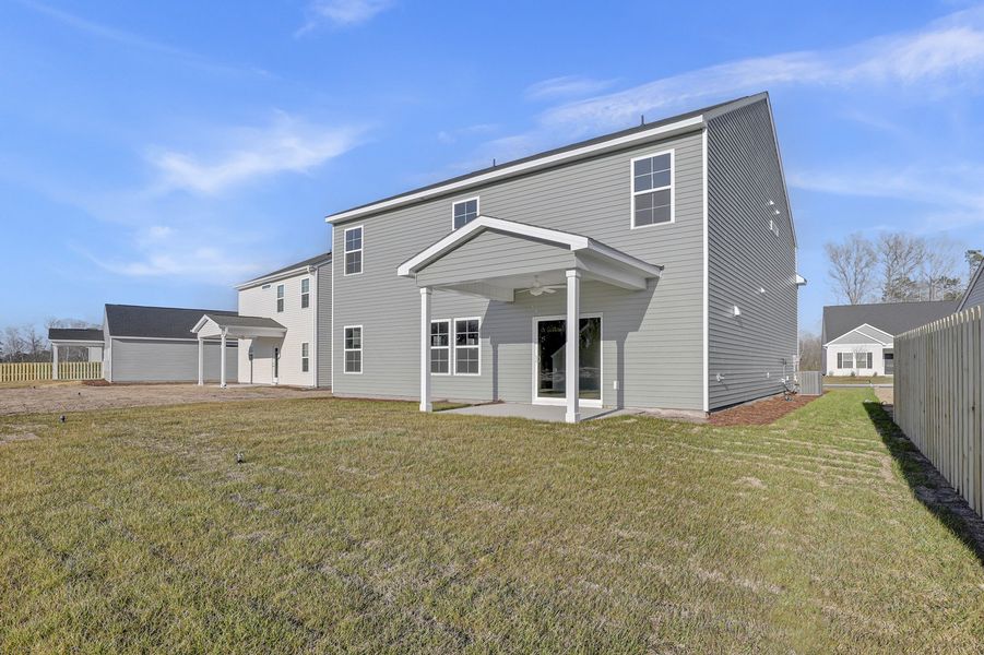 Exterior details and patio area of a home in Citadel Point at Southbridge, Sneads Ferry (Image 3).