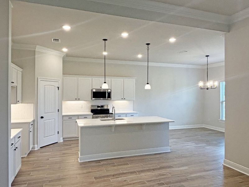 Furnished interior view inside a new home in Bird Song at Hammock Bay, Freeport (Image 8).