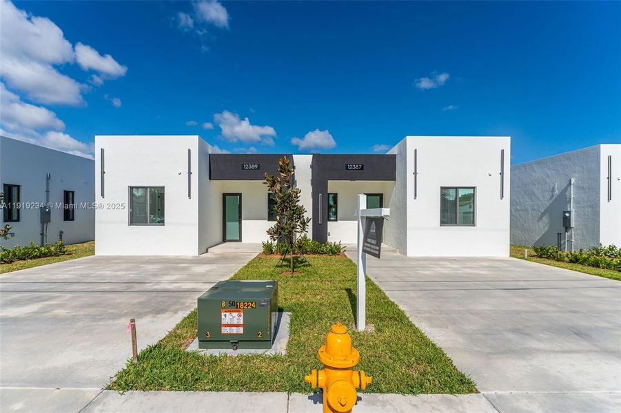 Front exterior of a new home in , Miami, FL, highlighting curb appeal (Image 2).