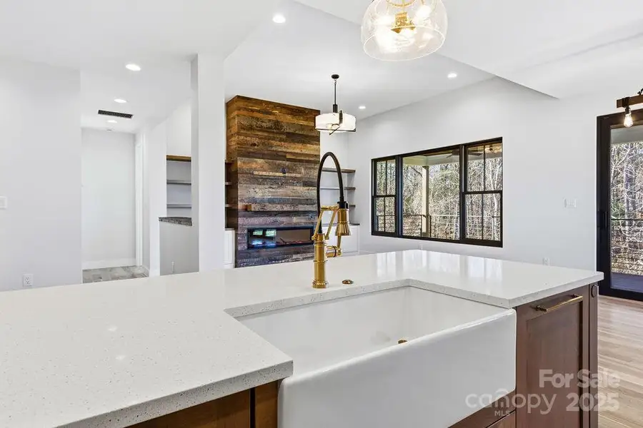 Seamless flow from living to dining and kitchen spaces