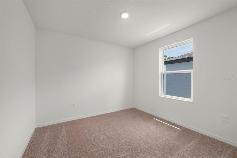 Spacious, unfurnished interior of a new home in Tula Parc, Astatula (Image 13).