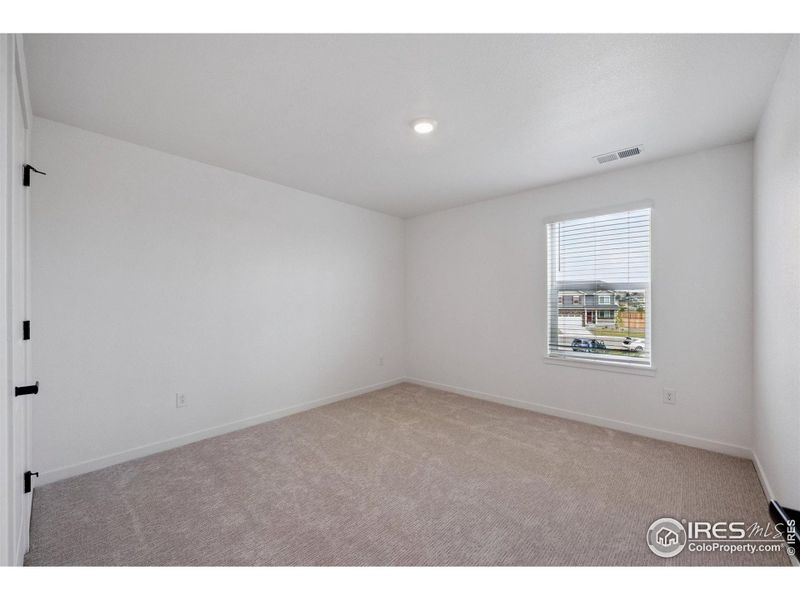 Spacious, unfurnished interior of a new home in Hansen Farm, Fort Collins (Image 26).