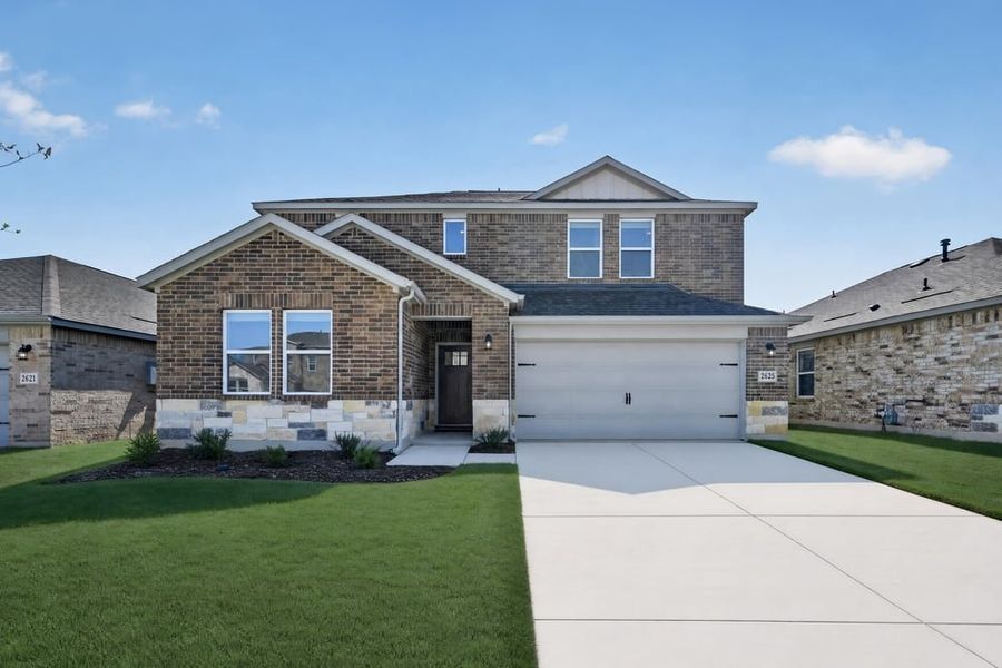 Front exterior of a new home in Parks at Foster Crossing, Anna, TX, highlighting curb appeal (Image 1). Front exterior of a new home in Parks at Foster Crossing, Anna, TX, highlighting curb appeal (Image 1).
