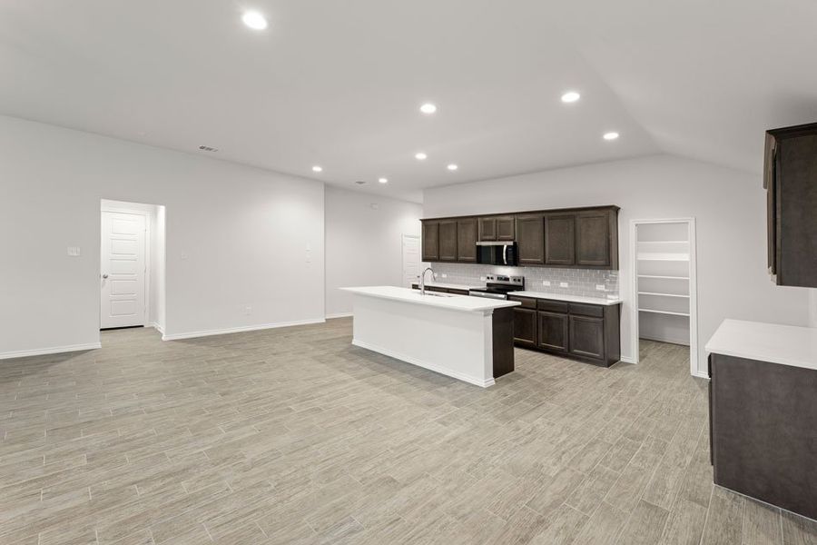 Representative exterior photo of a completed home built from the Lincoln by Impression Homes in DeBerry Reserve, Royse City, TX (Image 10).