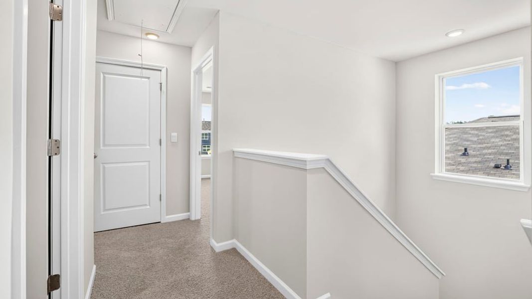 Spacious, unfurnished interior of a new home in Bentley Park, Greenwood (Image 23).