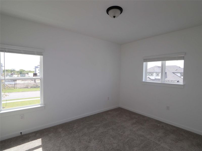 Spacious, unfurnished interior of a new home in Estancia West, Manchaca (Image 26).